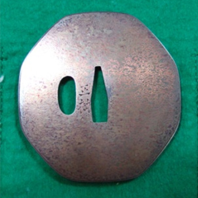 Tsuba with design of woodgrain pattern. Signed Made by Masamichi, a resident of Mimasaka province