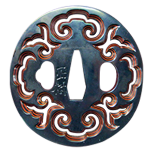 Tsuba with design of guri scrolls. Signed Shigenao with kao